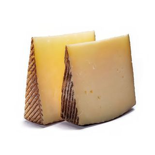 Queso D.O. Manchego Curado (1/2 ración)
