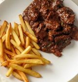 Chips served with liver and a free soda or water 