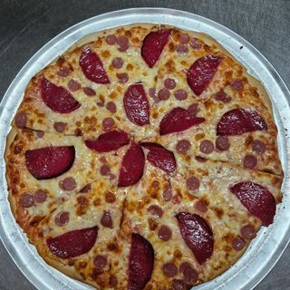 Pizza de 40cm con dos ingredientes y una  bebida grande 