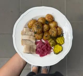 Каптопля з оселедцем