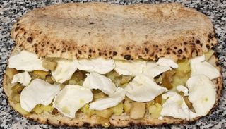 Panuozzo porcino metà