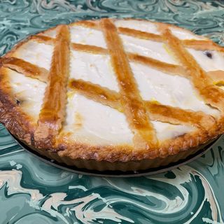 Fetta di crostata ricotta e nutella