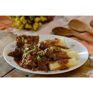 Wet Fried Goat's Meat With Boiled Cassava
