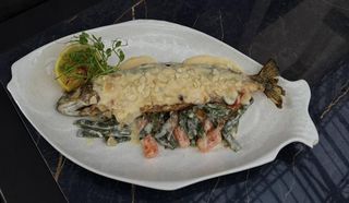 Форель у вершково-мигдальному соусі з шпараговою квасолею