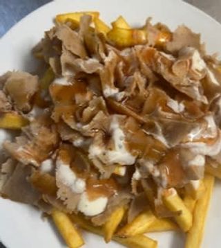 Patatas con carne (porción)