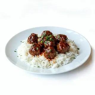 Plato 16: Albóndigas Con Arroz y huevo