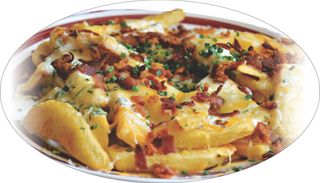 Patatas con carne queso grantinado