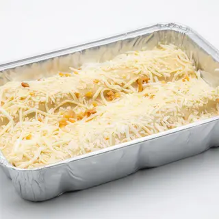 Canelón de pollo rustido con toping de almendra
