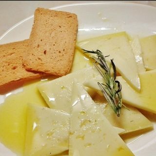 Baguette de queso manchego y aceite