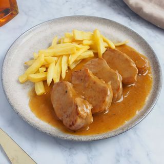 Ración De Solomillo De Cerdo Con Pimientos Rojos