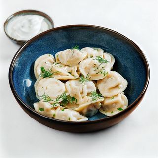 Dumplings 'Stroganov' with beef and pork