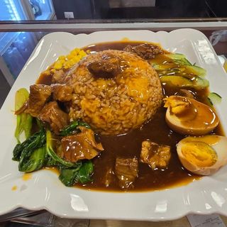 Riso con costolette di maiale