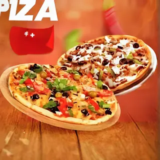 2pizzas aux légumes+2pizzas au poulet+2 boissons gazeuses 2 litres offertes