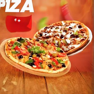 2pizzas aux légumes+2pizzas au poulet+2 boissons gazeuses 2 litres offertes