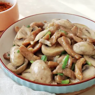 Cerdo Con Champiñones