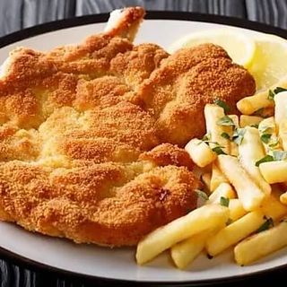 Cotoletta di pollo con patatine 