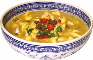 85 Filetto di branzino in brodo con verdure