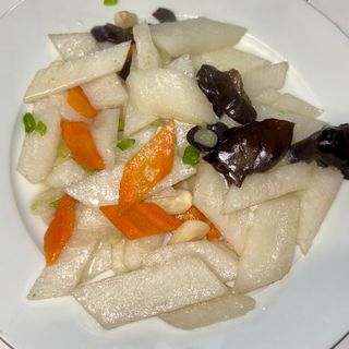 Ñame con setas salteadas