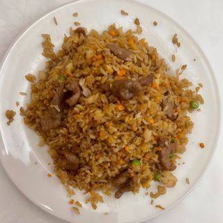 24. Arroz Moreno Con Ternera