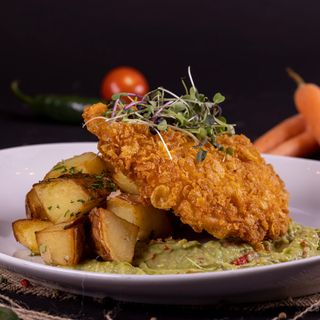 SCHNITZEL CROCANT PORC cu cartofi la cuptor 