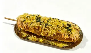 Hot-Dog con queso y cerdo en hilo
