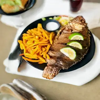Whole Tilapia and chips + soda