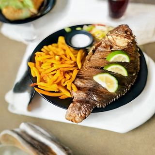 Whole Tilapia and chips + soda