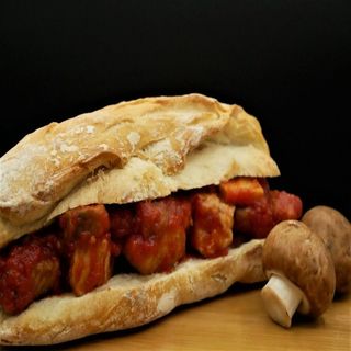 Medio Bocadillo De Magra Con Tomate