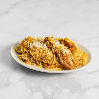 23. Chicken Biryani + Lattina Coca-Cola