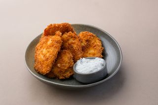 Золотые куриные наггетсы (150г)