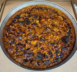 Arroz De Secreto Ibérico con setas variadas al aroma de romero (2 Raciones )