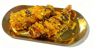 Alitas de pollo con salsa miel mostaza (2 uds.)