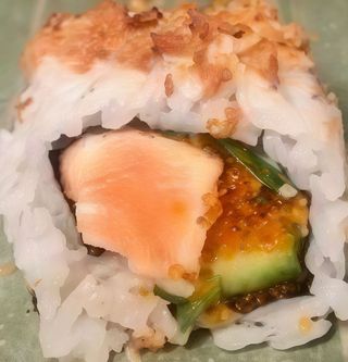 115. Yaki Salmón roll (8 piezas)