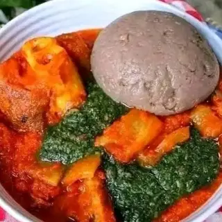 Amala served with ewedu mixed with chicken 