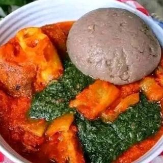 Amala served with ewedu mixed with chicken 