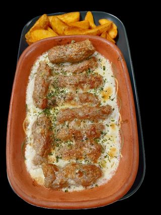 Ćevapi zapečeni u kajmaku