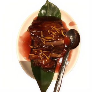 pato con salsa de ciruela