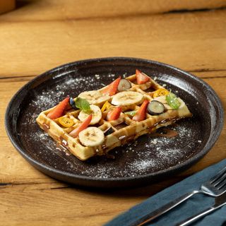 Belgian waffle with chocolate and banana