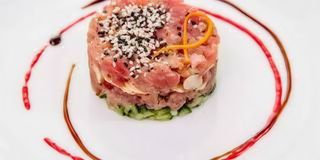 Tartare di branzino con salmone, olio e limone