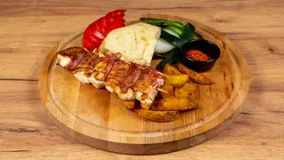 Rolovani pileći ili svinjski ražnjić 200g