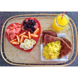 Scrambled Eggs with Toast, Fruit Salad and Juice