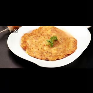 223.Omelette con cipolla