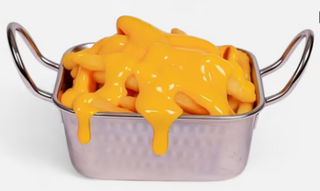 Cartofi prăjiți cu sos Cheddar