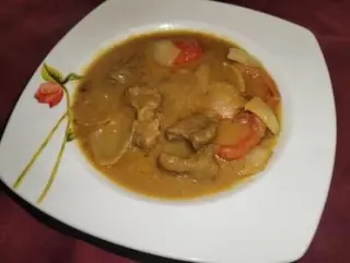 Agnello con aglio tikka balti