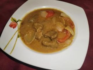 Agnello con aglio tikka balti