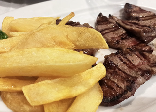 Presa Ibérica Con Patatas Fritas