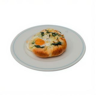 Bułeczka ze szpinakiem, serem i jajkiem