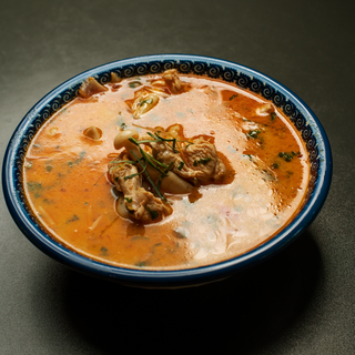 Zupa Tom Kha Hed z konfitowaną piersią kaczki