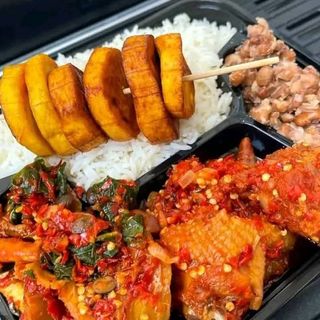 White rice with beans eforiro veges with chicken and plantains
