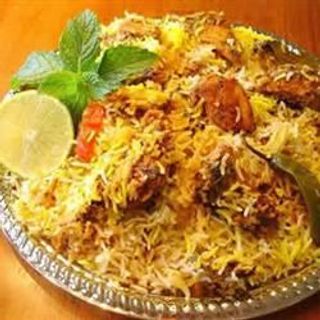 Biryani gosht o pollo biryani